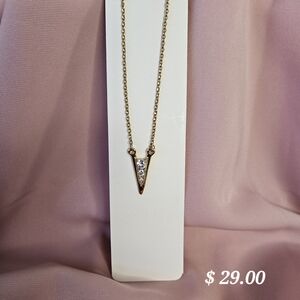 Elegant Gold Necklace with Silver Accents